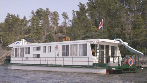 20' wide x 65' long Super wide body houseboat on lake of the woods